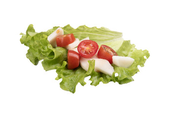 portion of small, fresh tomato and lettuce salad isolated in close-up