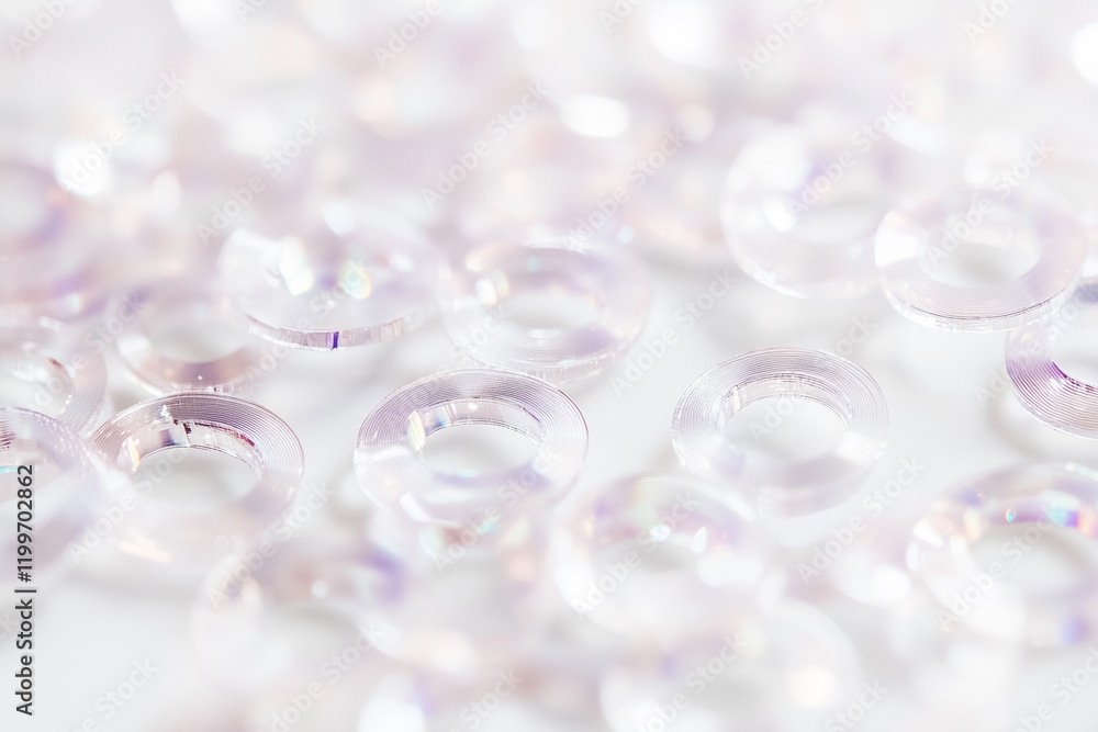 Poster layers of transparent glittery sequins create a shimmering textural effect perfect for crafts and de