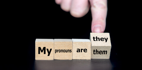 Cubes form the expression 'my pronouns are they them'. Symbol for gender neutral pronouns.