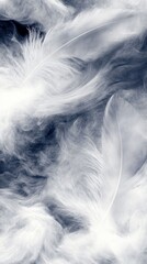 Obraz premium Soft, ethereal white feathers swirl against a dark background, creating a dreamy, textured image.