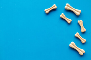 Dog food and treats - chew bones pattern, top view