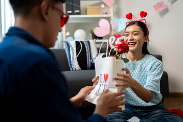 Asian couples show their love to each other by giving each other flowers or surprise gifts on important occasions, such as Valentine's Day, birthdays, or anniversaries, 