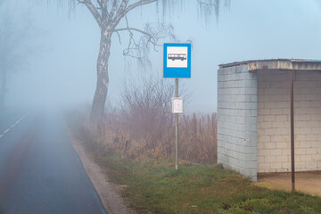 road during morning fog. Bad weather conditions while driving will occur in autumn and winter. poor...