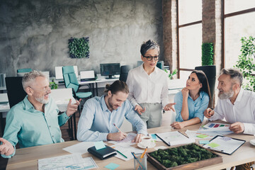 Photo of coworking project teamwork people mature female boss brainstorming work together...