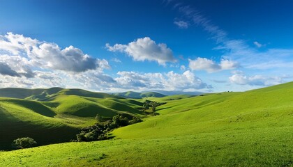 a peaceful landscape with lush green hills and soft white clouds under a bright blue sky