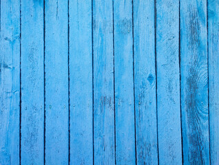 Old wood wall texture with blue peeling paint