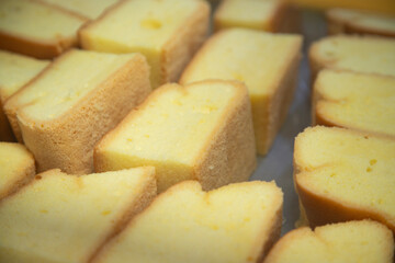 Traditional sweets stand with empanadas, cocadas, mamones in the Oaxaca food market.