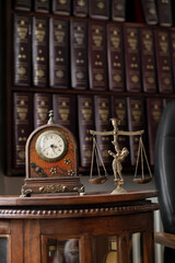 An office of a Greek law firm, featuring a statue of Themis, the goddess of justice, symbolizing...