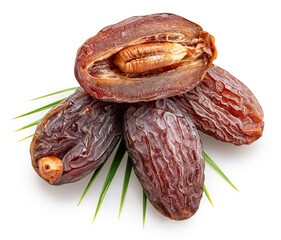 Semi-dried dates or date palm fruits lie on palm leaves isolated on white background. File contains...