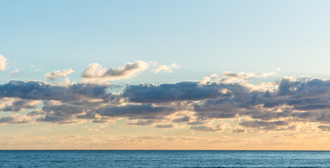 Sunset at Cyprus Beach: Pastel Colors, Clouds over the Sea, Rocky Cliff