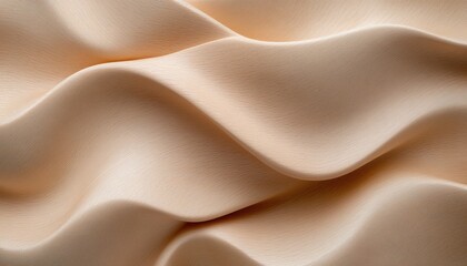 Obraz premium Soft beige fabric ripples gracefully, capturing light and highlighting elegant texture