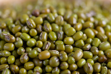 Mung beans background, close up. Healthy plant-based protein, healthy cooking ingredient for vegan recipes and vegetarian diets