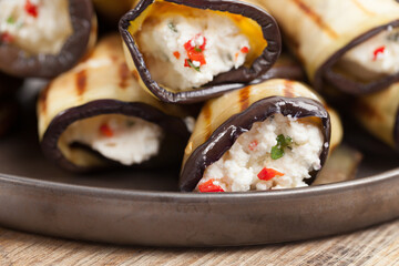 grilled eggplant with feta cheese, fresh mint and chili pepper.