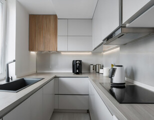 Minimalist kitchen design featuring modern appliances and a cozy atmosphere with soft lighting