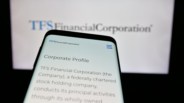 Stuttgart, Germany - 01-15-2025: Mobile phone with website of US financial company TFS Financial Corporation on screen in front of business logo. Focus on top-left of phone display.