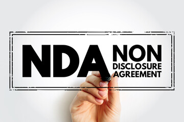 NDA Non-Disclosure Agreement - legal contract between two parties that outlines confidential...
