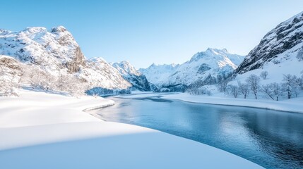 Obraz premium Serene winter landscape snow-covered mountains, frozen river, clear blue sky.