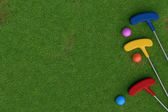 Colorful mini golf clubs and balls on green grass. Top view 3d rendering