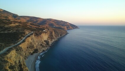 A breathtaking aerial view of the coastline in Ikaria, Greece at sunset.