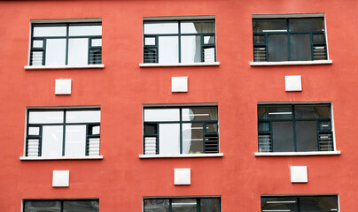 Many windows in front of the apartment