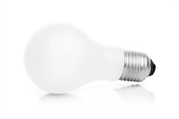 A single white light bulb sits on a clean white surface, ready for use