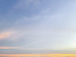 Beautiful sky with natural gradations. Thick clouds in the dusk sky on a winter night. Image of a cloudy sky in the afternoon. View of the night sky with golden light from the evening sun