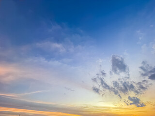 Beautiful sky with natural gradations. Thick clouds in the dusk sky on a winter night. Image of a cloudy sky in the afternoon. View of the night sky with golden light from the evening sun