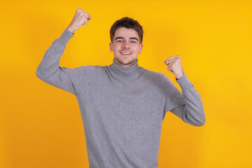 teenager celebrating isolated on background