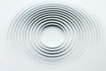 Obraz premium A single white circular object on a white background