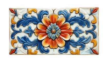 A rectangular ceramic tile features a central flower surrounded by intricate blue and gold floral patterns, creating an elegant and colorful design.