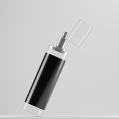 A clear cylindrical spray bottle rests at an angle on a white background. Its silver pump and open clear cap are ready for use. A sleek black label wraps around the bottle.