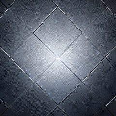 The background consists of gray diamond-shaped metal panels with a textured surface, arranged at an angle and converging to the central point of the light, creating an effect of depth and volume.