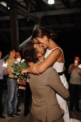 newlyweds at a wedding of sparklers