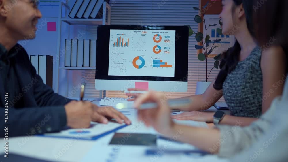 Aufkleber professional business team analyzing financial data on computer screen during collaborative meeting,