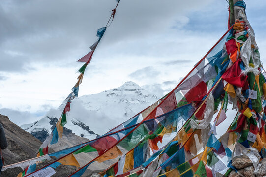 Tibetan Chorten and Colorful Prayer Flags at Rongphu Monastery, near Mount Everest Base Camp in Tibet, China