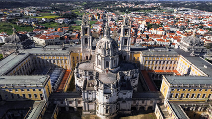 landmarks of Portugal and famous places. Mafra National Palace, barocco style architecture. Unesco heritage site. High angle drone aerial view