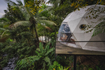 Experience the breathtaking beauty of a stunning geodesic dome, surrounded by a vibrant tropical landscape that offers an immersive and calming nature experience, East Java, Indonesia