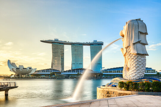 Merlion Statue Illuminated during Sunrise in the Marina Bay, Singapore