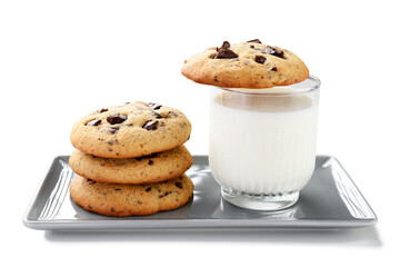 Delicious chocolate chip cookies with glass of milk isolated on white background.