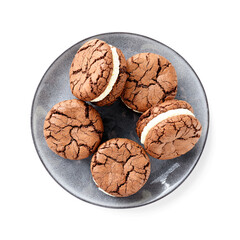 Chocolate sandwich cookies, brownie biscuits with  cream cheese filling isolated on white background, top view