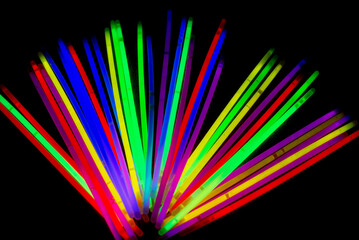 Night party gadget shining with chemical lights in rainbow colors