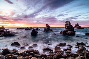 Obraz premium Amazing sunrise at the coastline of the sea - Cala Frares, Costa Brava (Catalonia, Spain) 