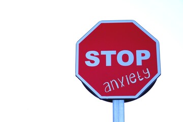 stop anxiety. mental health. letters written on a stop sign.