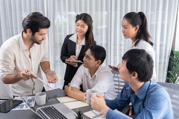 Group of diverse office worker employee working together on strategic business marketing planning in corporate office room. Positive teamwork in business workplace concept. Prudent