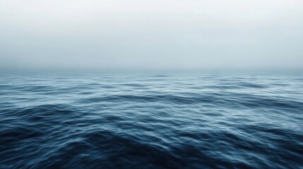 Fototapeta premium Serene ocean view on a misty day.