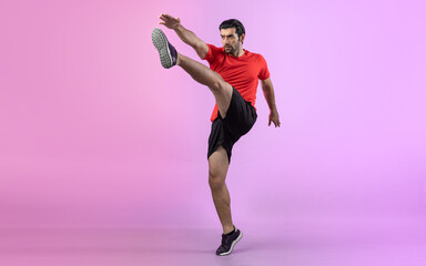 Full body length gaiety shot athletic and sporty young man with fitness in cardio exercise, kicking position posture on isolated background. Healthy active and body care lifestyle.