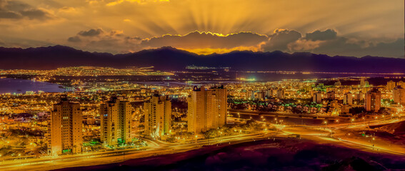Panoramic aerial view on Eilat (Israel) and Aqaba (Jordan) cities during sunrise. My own photos and...