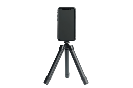 Smartphone mounted on tripod for stable photography or video recording setup in a home or studio environment