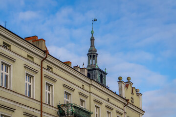 Obraz premium architecture of the old town. old style streets and buildings. architecture and buildings on the market square in the city. historic tenement houses with a view of the town hall tower