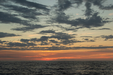 Ocean Sunset with Vibrant Sky and Clouds